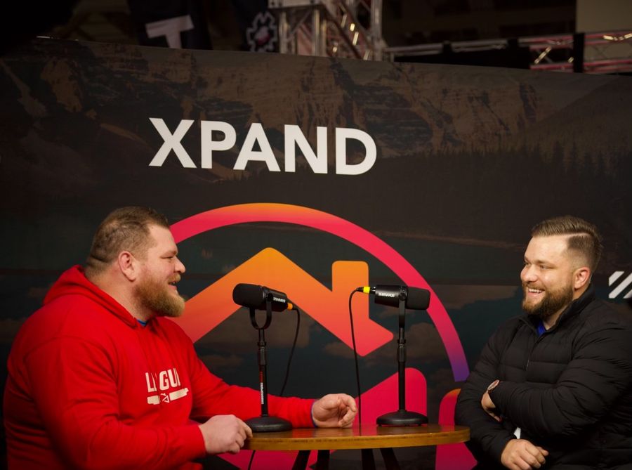 Jeremy Davis being interviewed on the XPAND podcast set at a real estate event